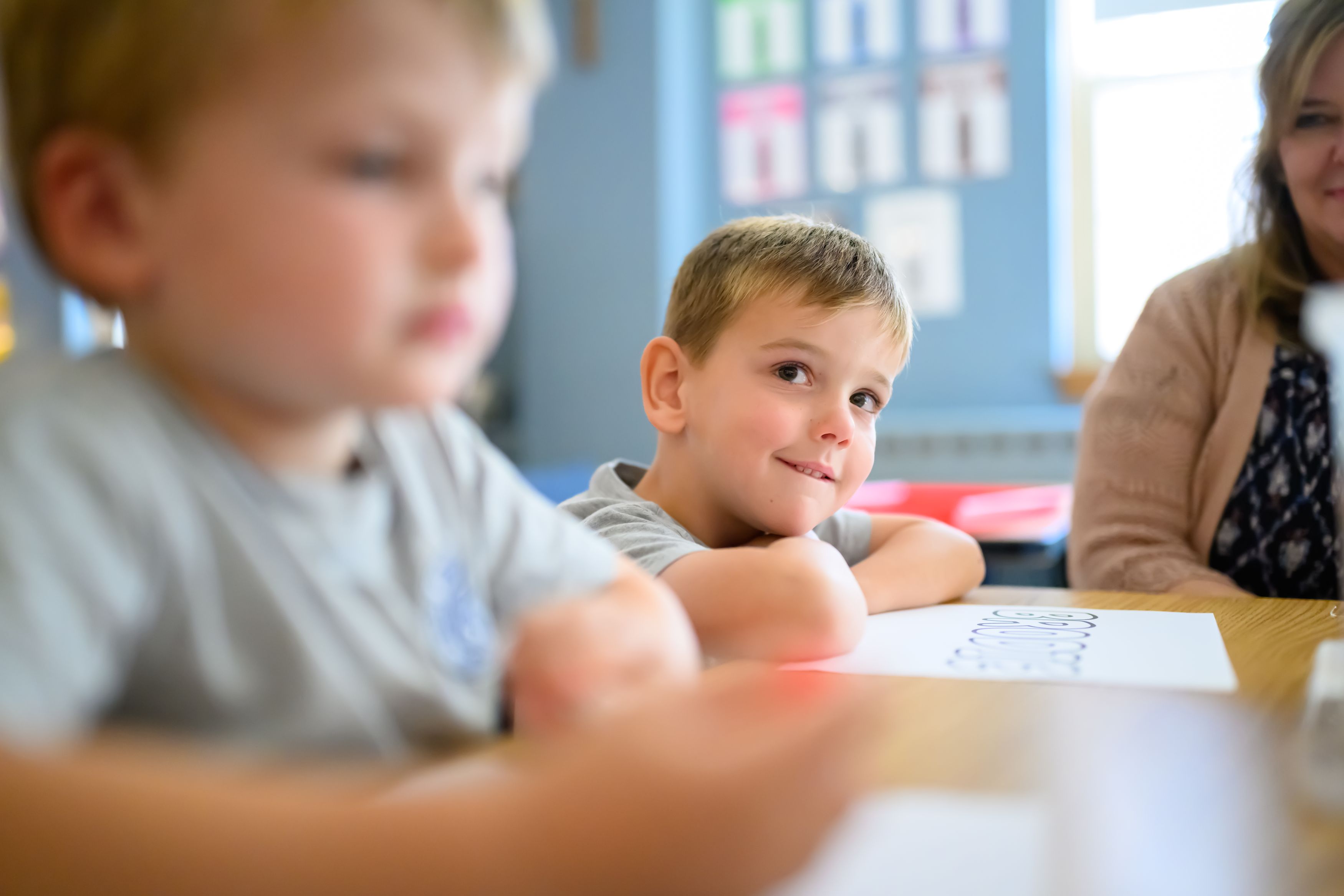 Young students at a classroom table