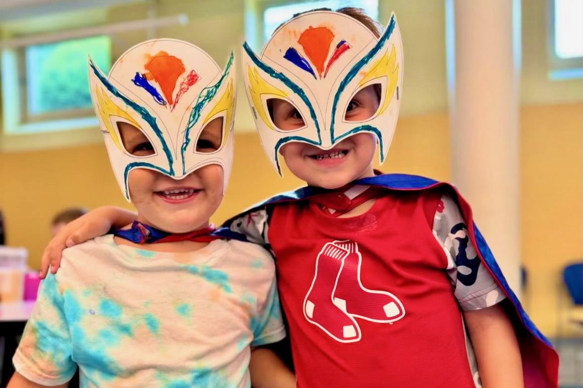 Summer campers in superhero masks